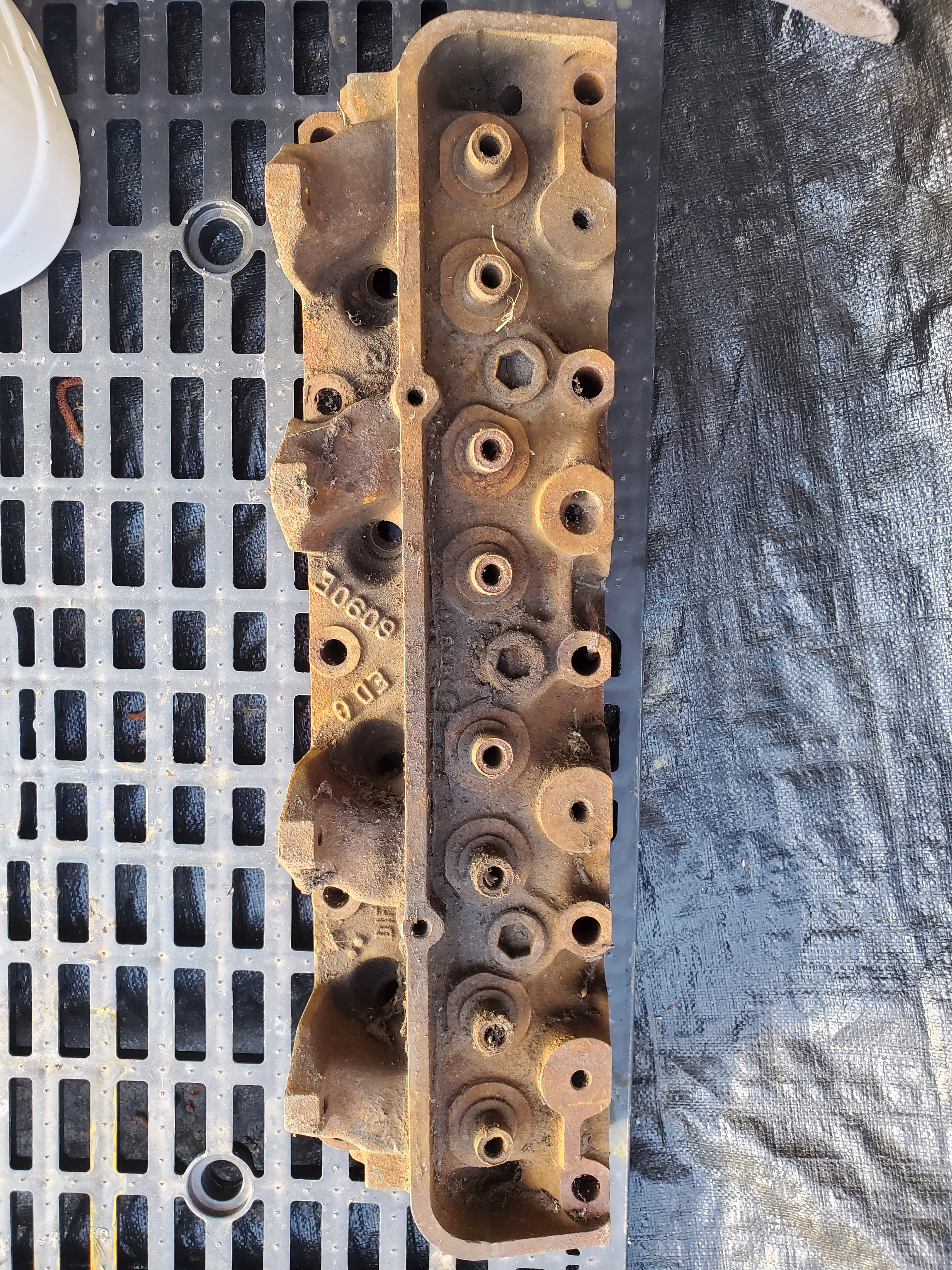 Prepping parts before the vibratory process begins.